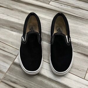 Vans unisex Black and White Slip-On Sneakers
